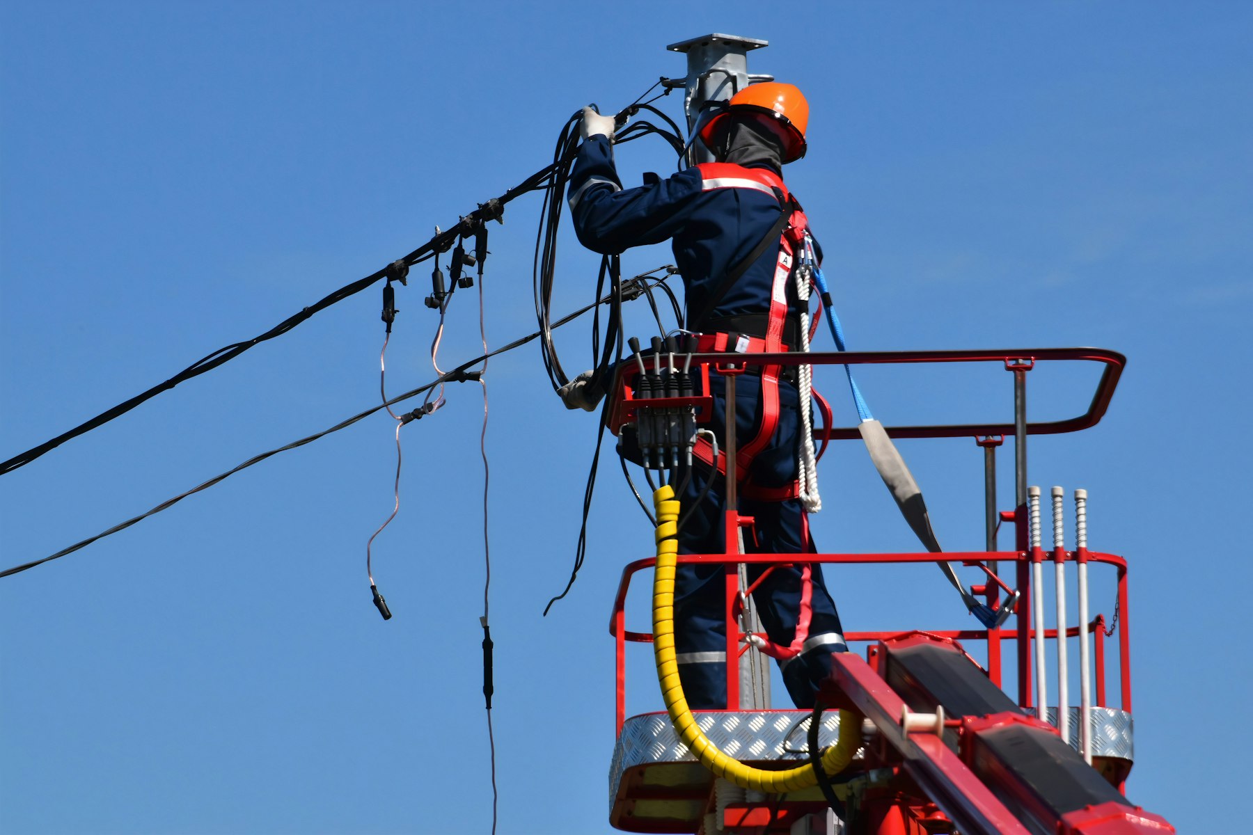 Crew restoring service on a utility pole